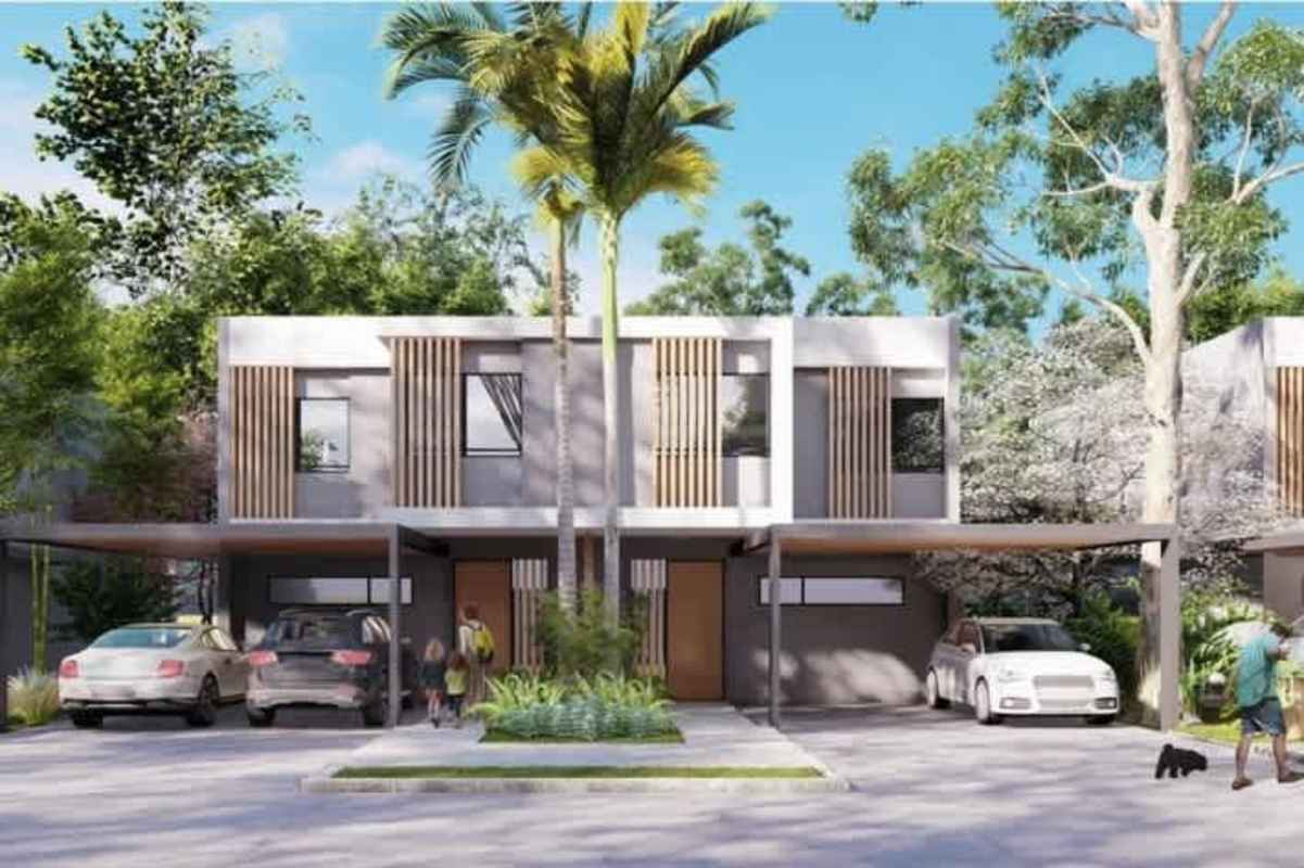 Modern master bedroom with panoramic window and nature views Riverwalk Villas Panama Norte