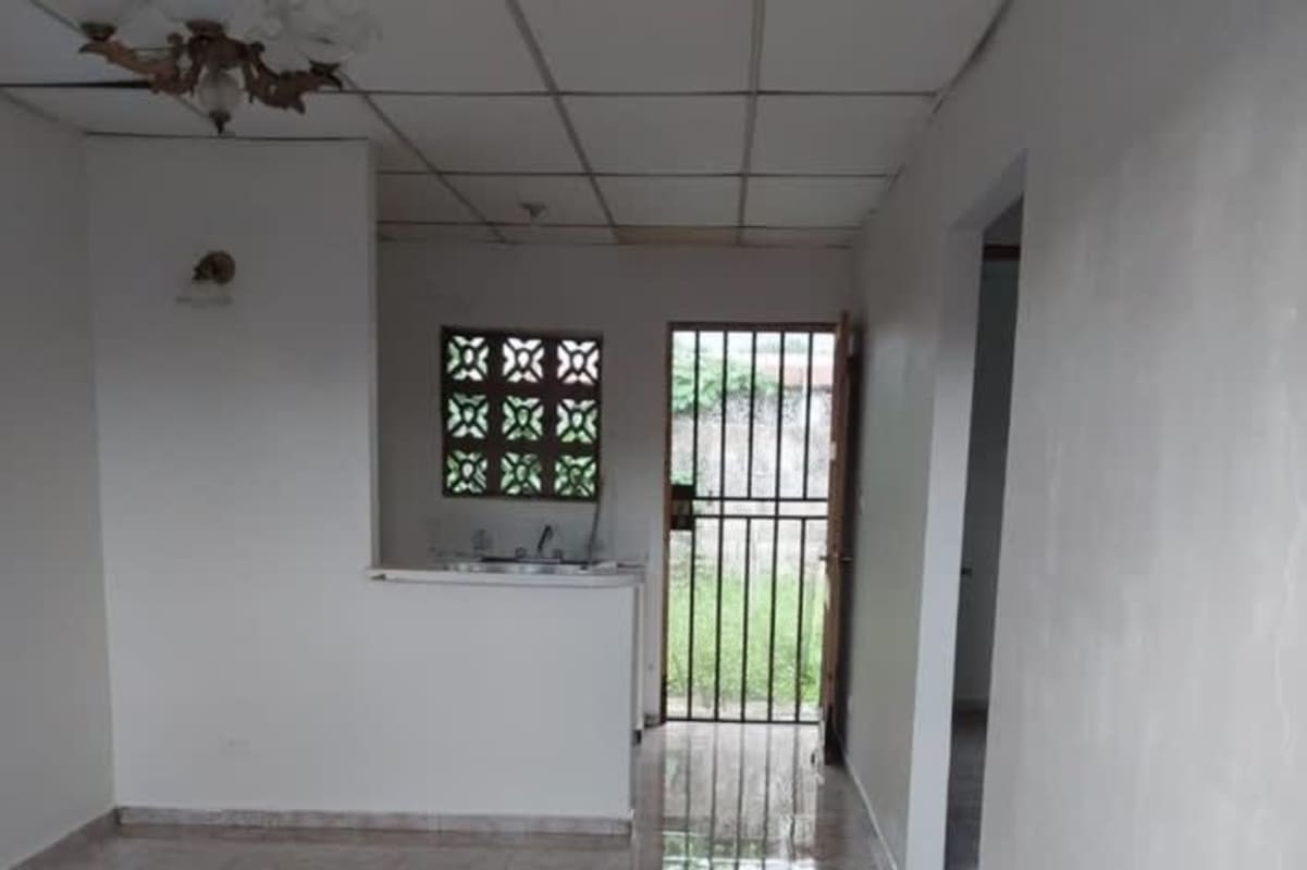 Basic kitchen space in house with tile floor and ventilation blocks, Torremolinos Tocumen Panama
