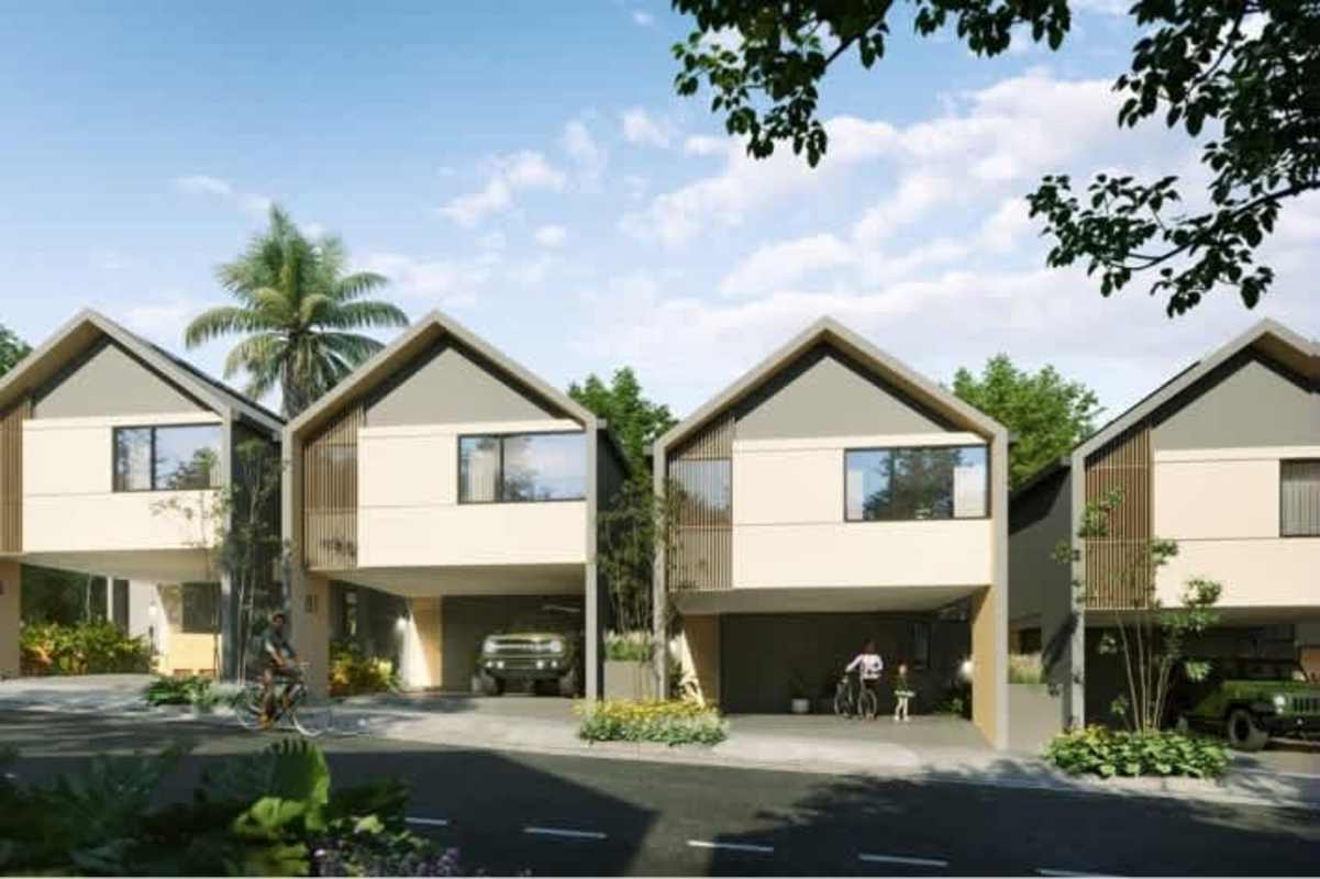 Modern living space with large windows and wooden flooring facing garden in Green City