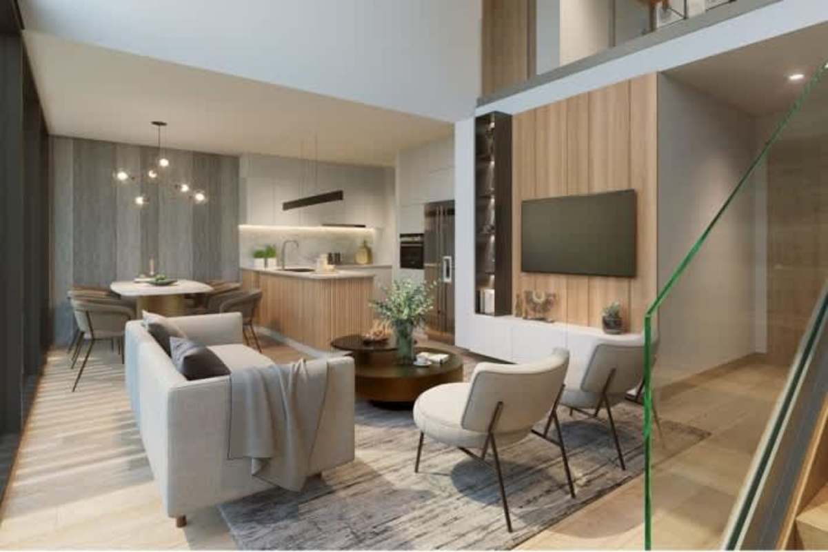 Row of contemporary two-story villas with carports and gabled roofs at Green City