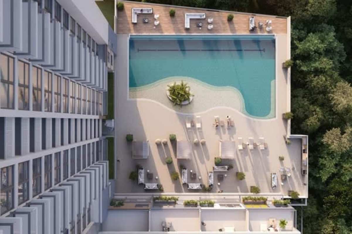 Infinity pool with sun loungers, cabanas and ocean views at Oceana Santa Maria rooftop