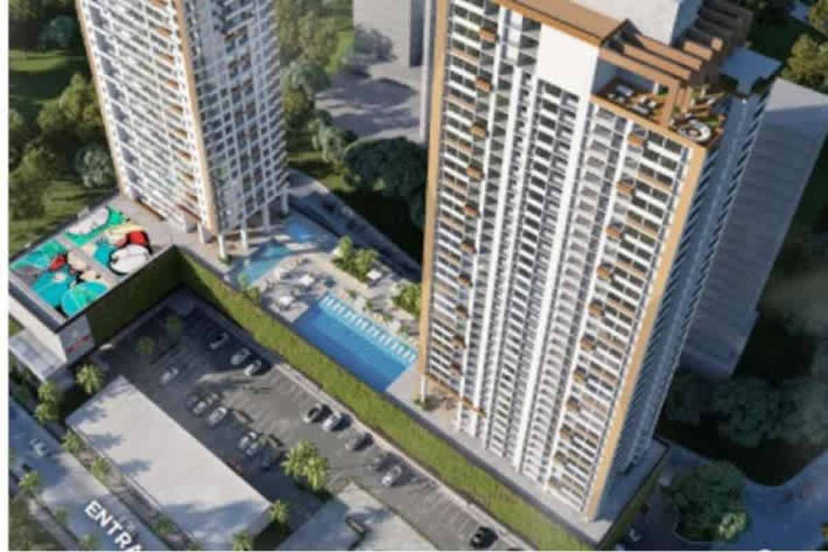 Aerial city view of Greenwood Towers featuring pool, playgrounds, towers in El Bosque Panama