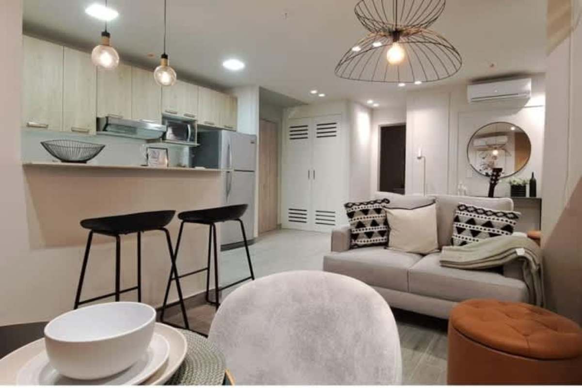 Modern open kitchen with breakfast bar, living area in PH Greenwood Towers Tower 200 Panama
