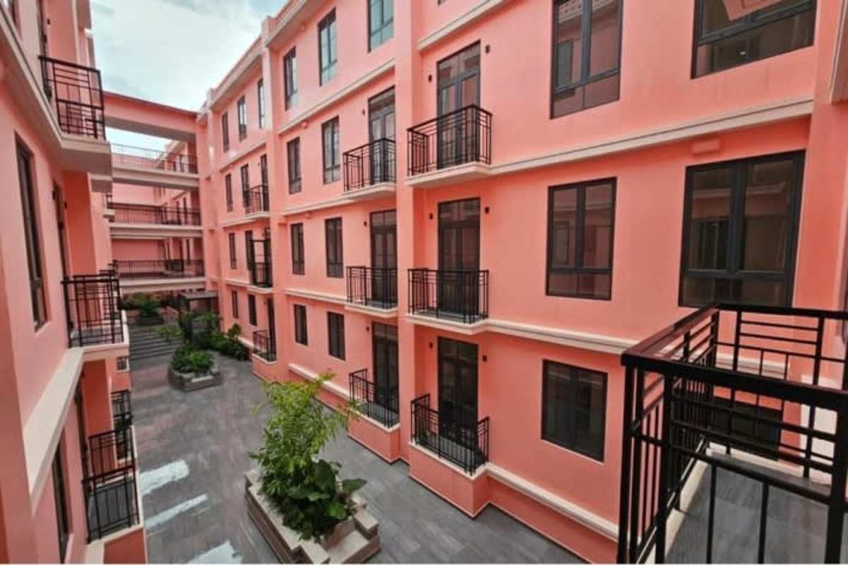Pink building courtyard with balconies historic Casco Viejo apartment Panama