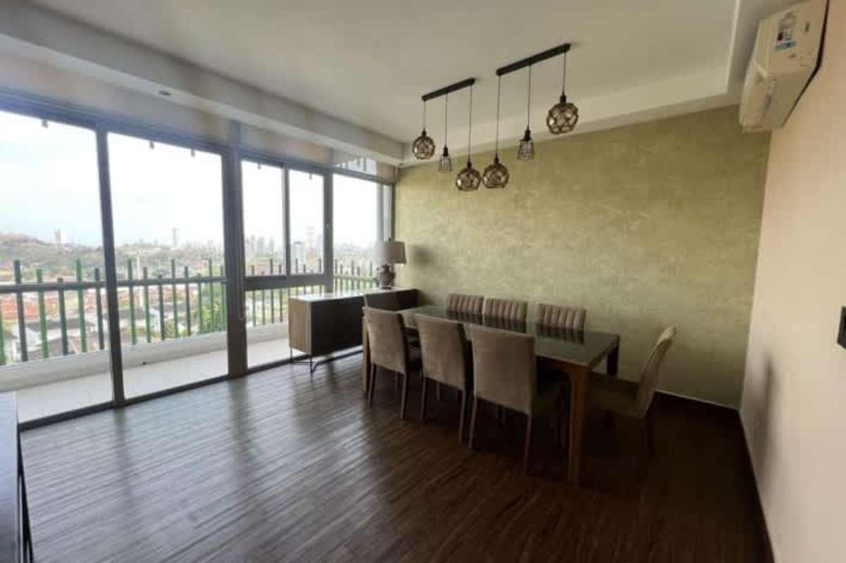 Living room with access to balcony, panoramic windows in PH Horizontes Altos de Panamá