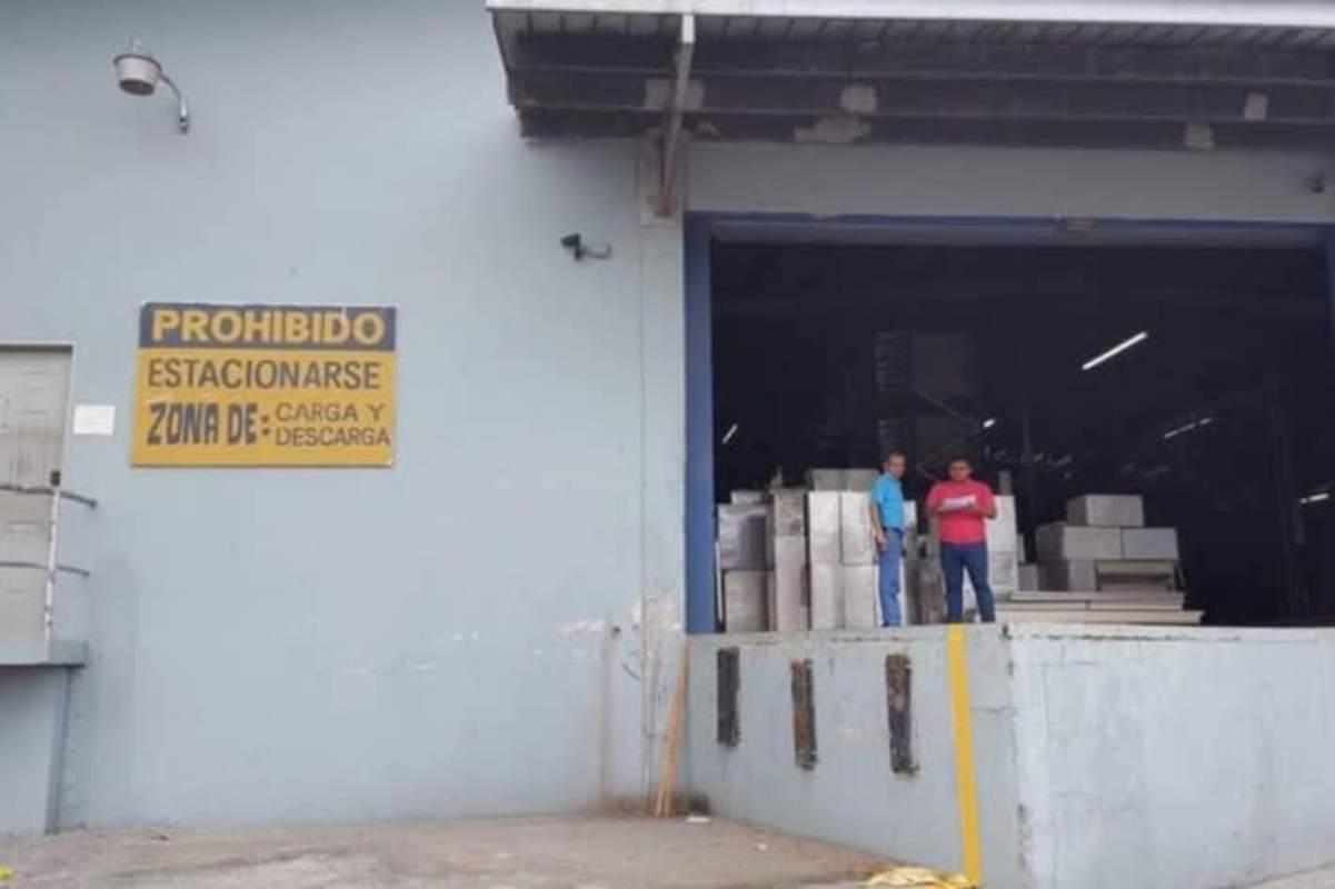 Exterior of warehouse with wide gate, loading dock zone Tocumen Industrial Area Panama