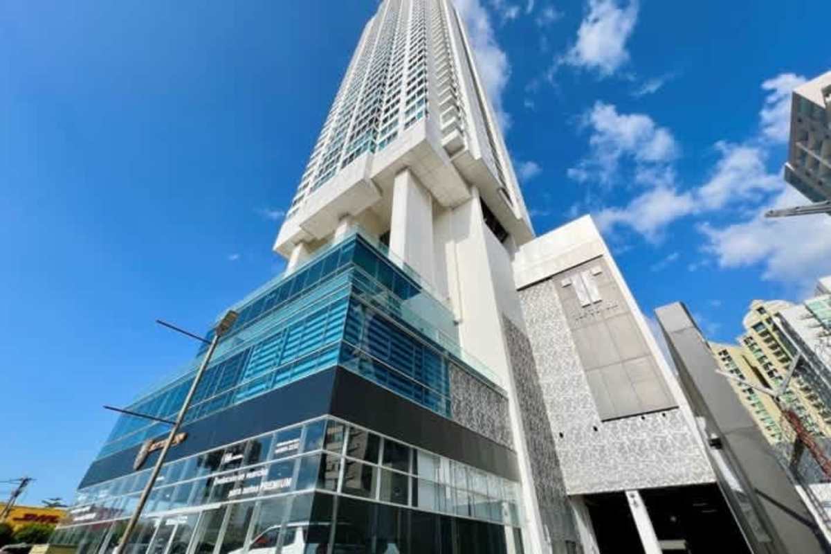 Skyline view of tall modern skyscraper PH Top Towers Costa del Este Panama