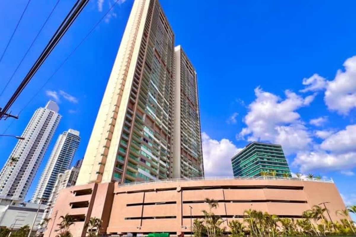 Modern condo tower with secure gate landscaped grounds PH Sevilla Costa del Este Panama