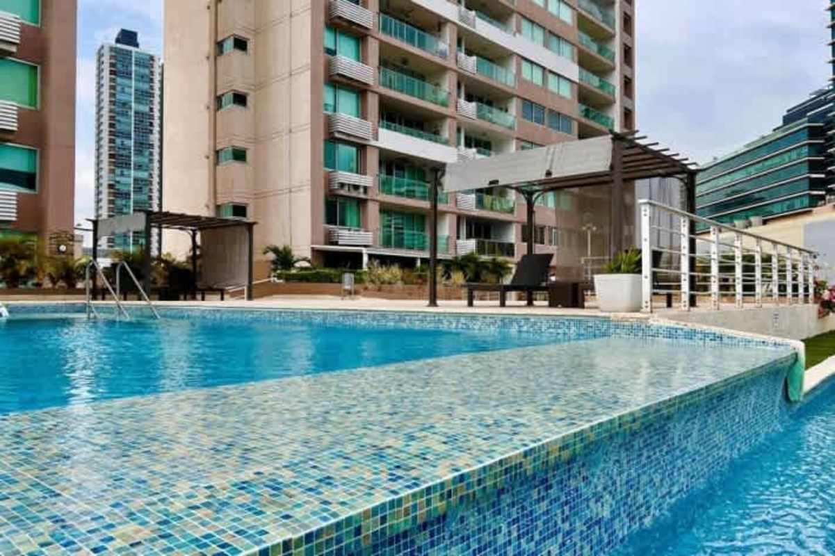 Modern infinity pool with pergola seating area rooftop amenities PH Sevilla Panama