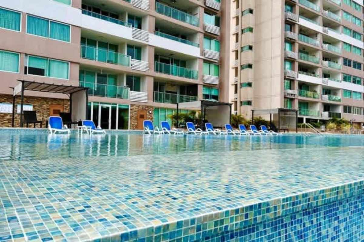 Modern Costa del Este high-rise with balconies and parking garage PH Sevilla Panama City