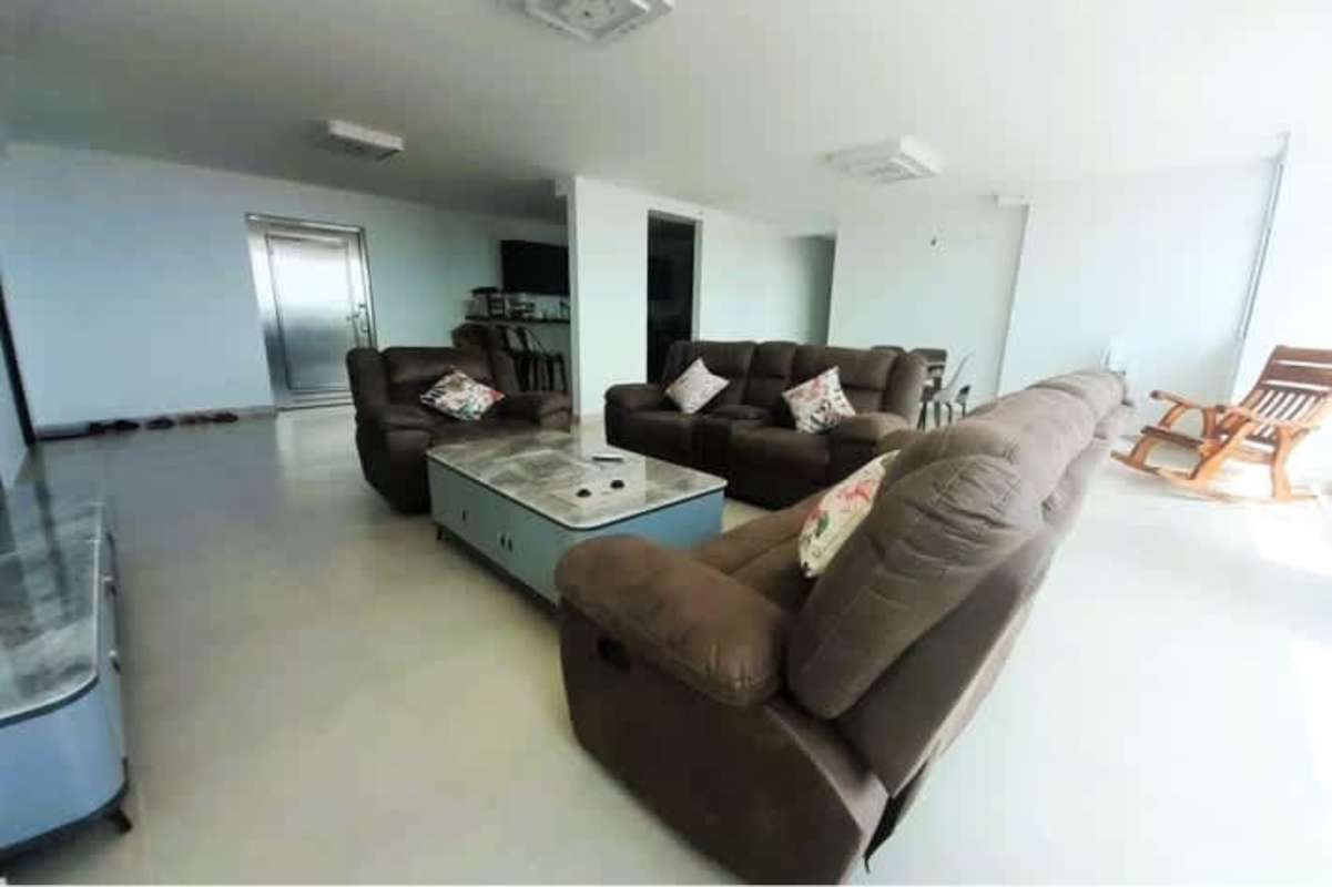 Spacious bright living and dining room with large windows in PH Country Heights Condado del Rey Panama