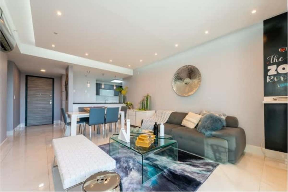 Bright master bedroom with closet floor to ceiling window skyline view PH Pacific Park Betania