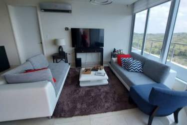 Bright living room with large windows and ocean view at PH Casa Bonita Playa Bonita near Panama City