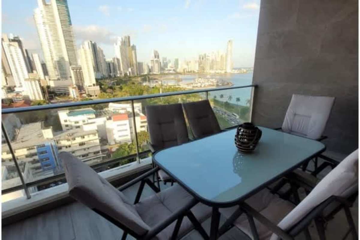 Bright living room with ocean and skyline views at PH Destiny, Avenida Balboa Panama