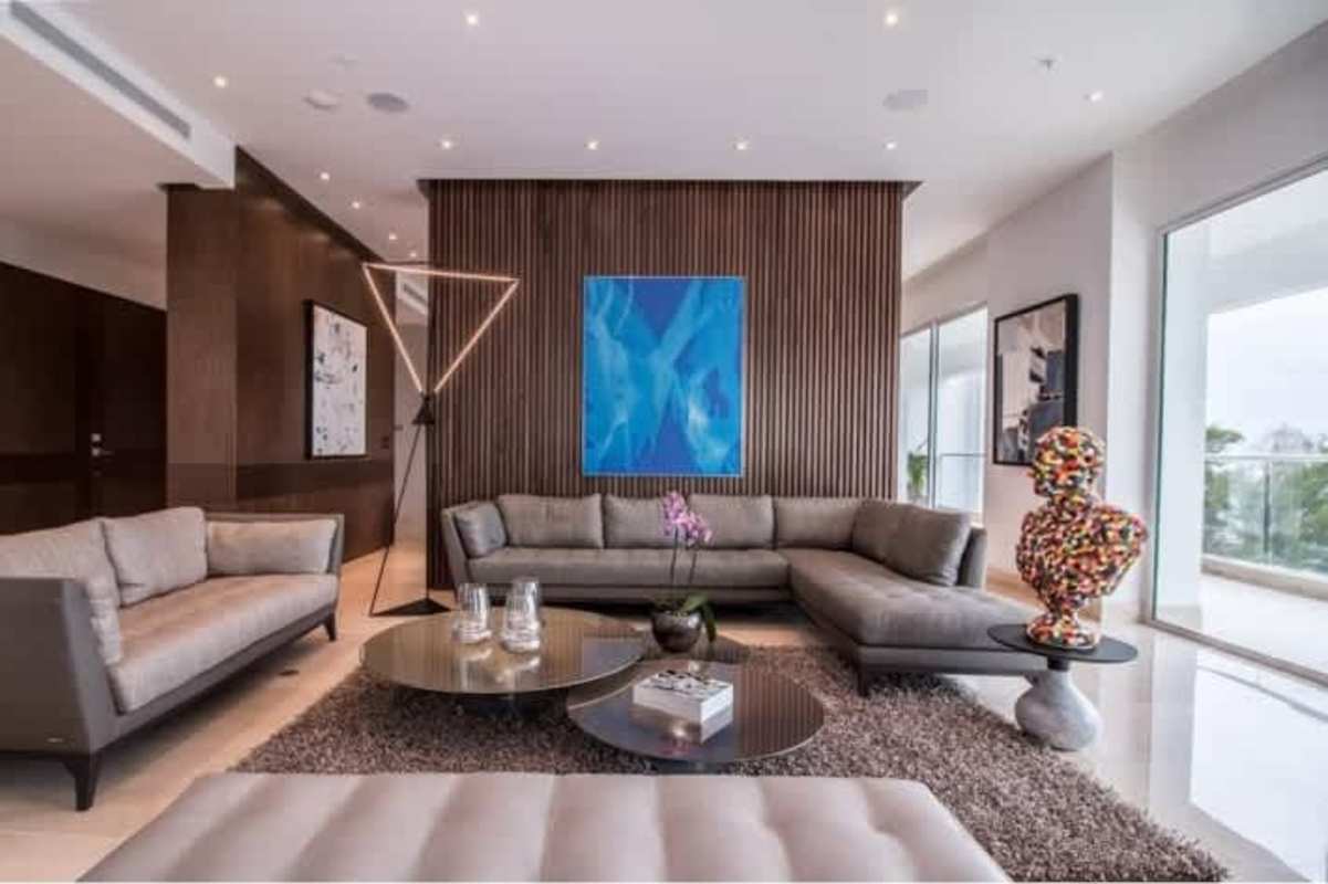 Open concept living room with city panorama marble floors PH Santa María Costa del Este Panama