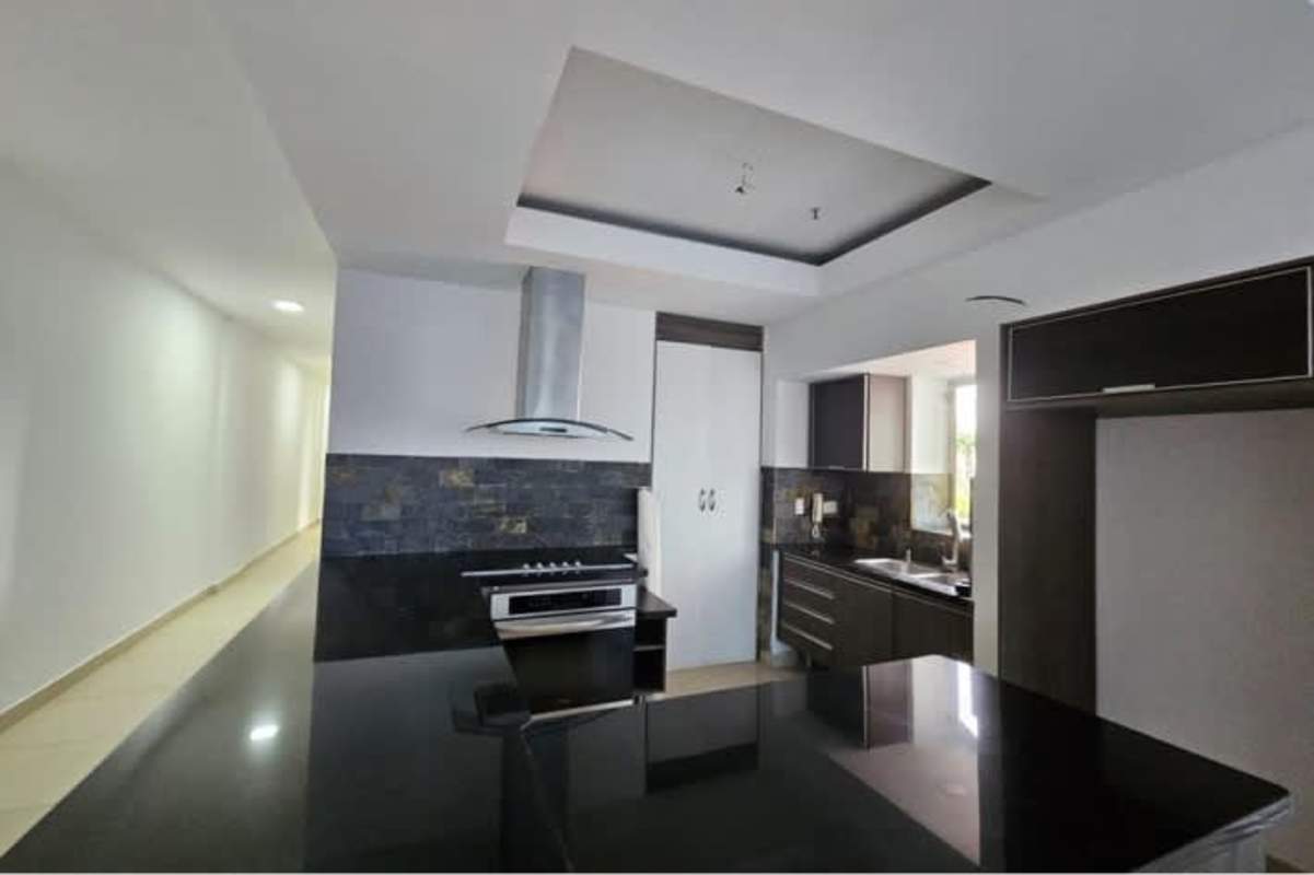 Master bedroom with large window and ocean view in rental apartment PH Rivage Panama City