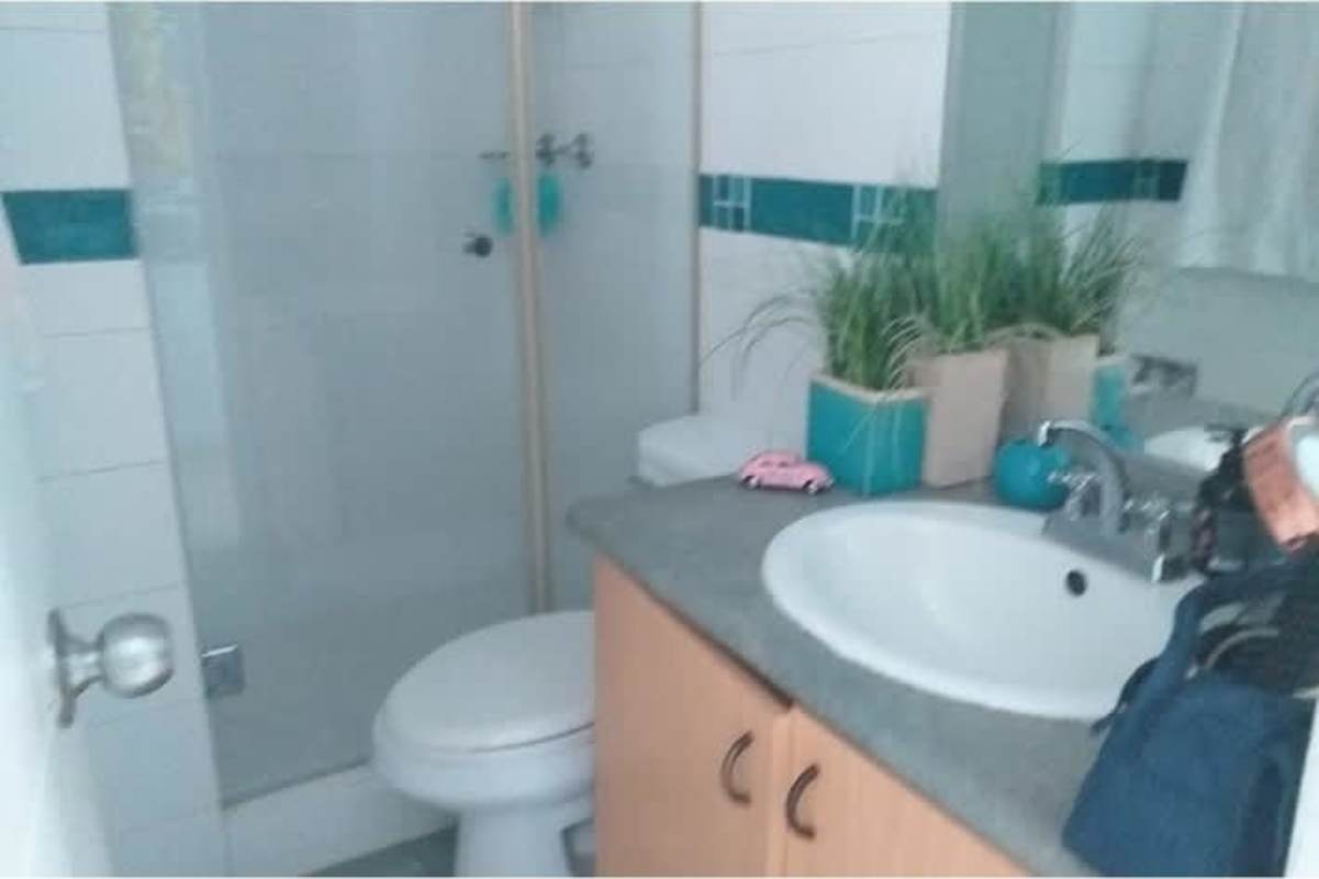 Furnished bedroom with city views, AC and blue walls in PH San Francisco Bay Panama