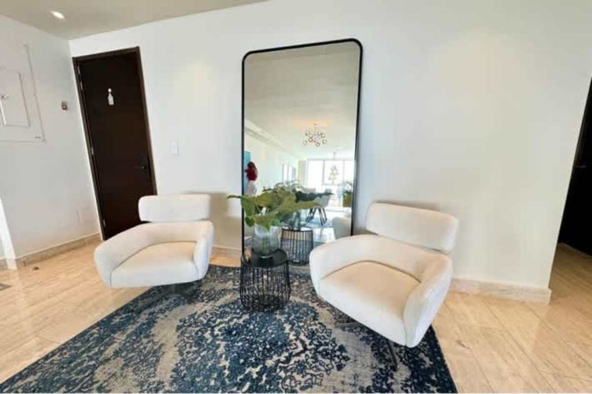 Contemporary dining room with modern lighting and marble floor PH Oceana Tower Panama