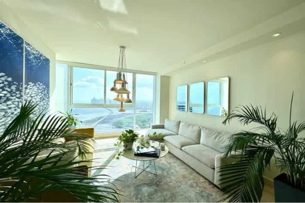 Spacious living room with floor-to-ceiling windows overlooking ocean PH Oceana Tower Panama