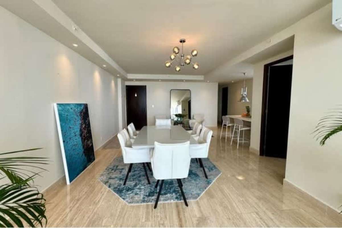 Modern dining room with luxury marble flooring and chandelier PH Oceana Tower Panama