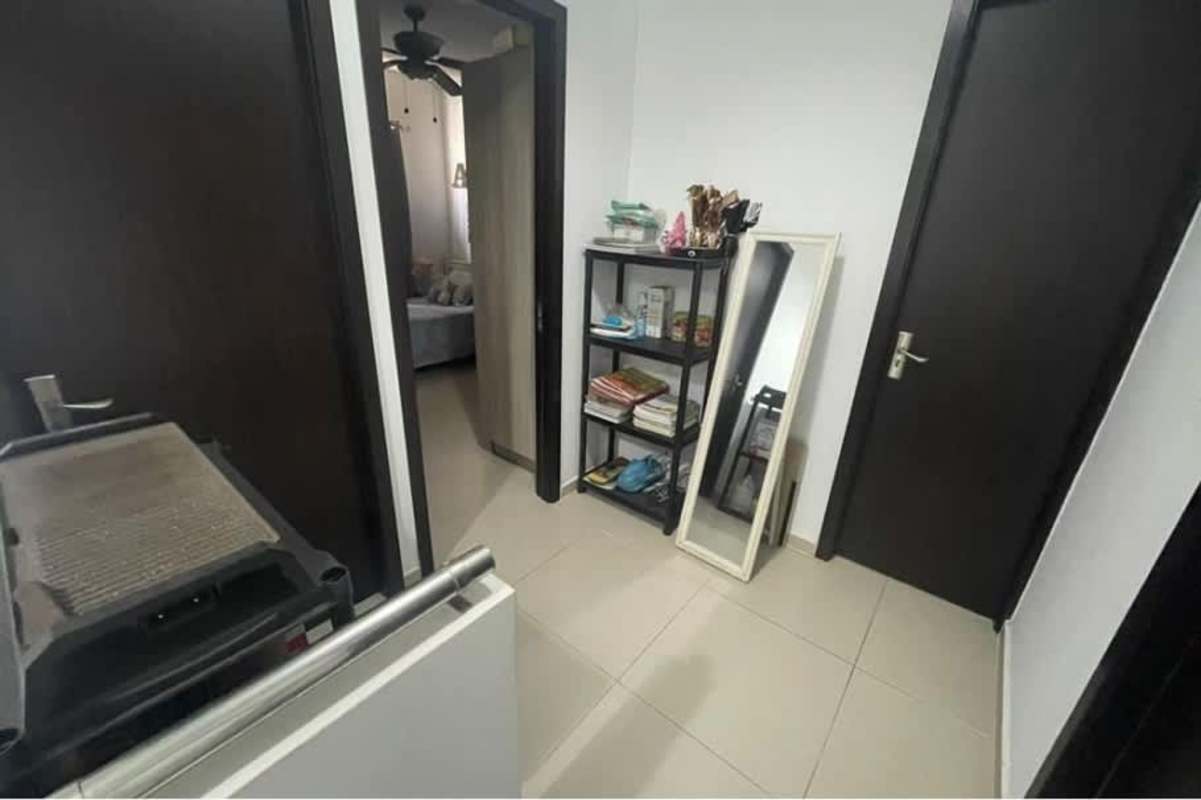 Upstairs bedroom with balcony, ceiling fan, closet in Villasol townhouse Panama