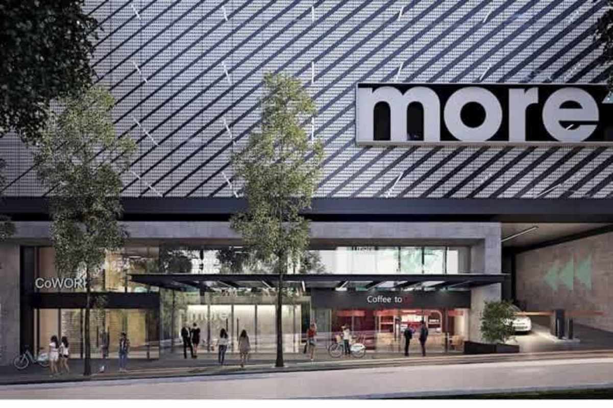 Modern condo tower facade with glass and retail front in PH More Panama City