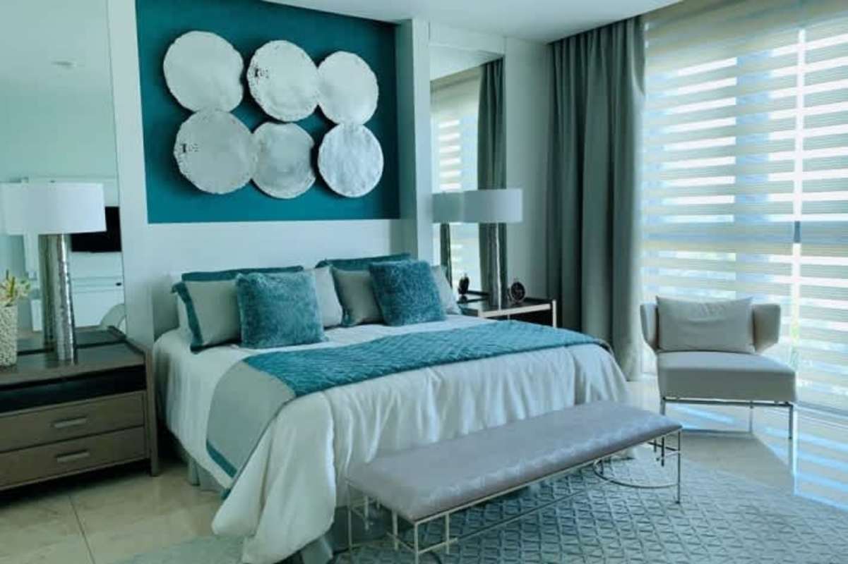 Spacious master bedroom fully furnished with city and golf views Santa María Panama