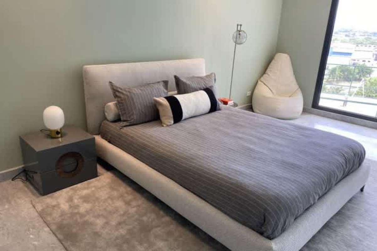 Master bedroom with ocean views, floor-to-ceiling windows, marble flooring Costa del Este Panama