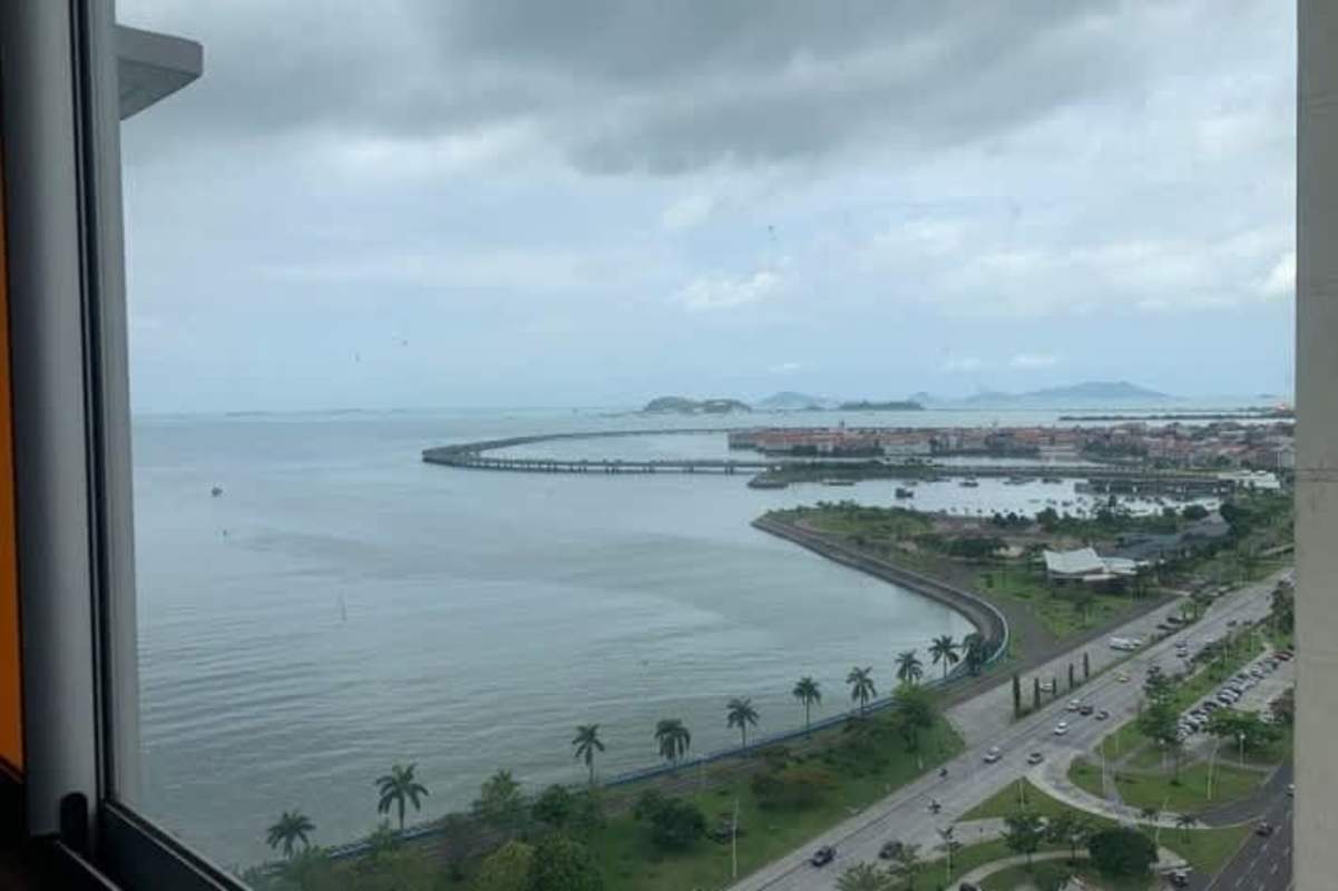 Furnished bedroom with modern design, large window and city views in PH BICSA Tower Panama City