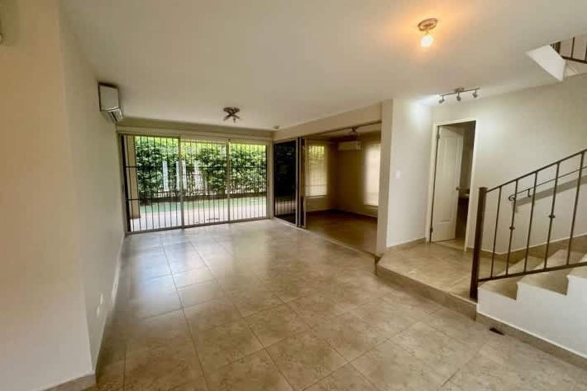 Large kitchen with granite countertop, wood cabinets, stainless oven Embassy Gardens Clayton Panama