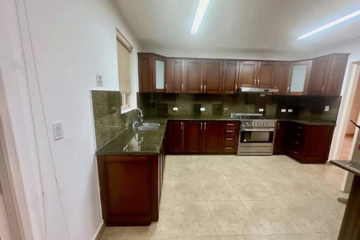 Laundry room with washer dryer and utility sink Embassy Gardens Clayton Panama