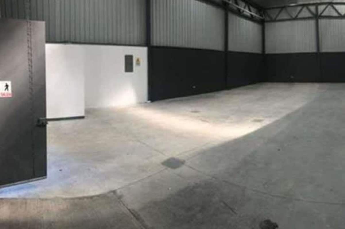 Exterior view of connected industrial warehouses with ample truck space in Altos de Tocumen, Panama City