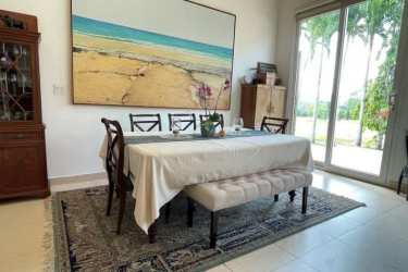 Private swimming pool beside terrace overlooking golf course at Tucan Country Club Panama