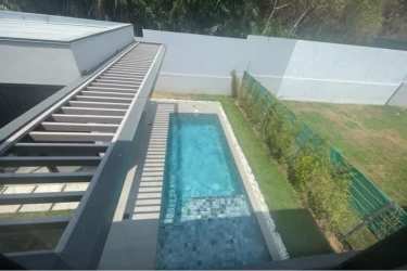 Open living space with floor-to-ceiling windows in luxury Panama Pacifico residence