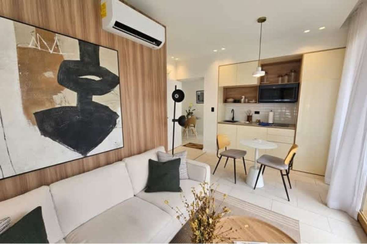 Cozy bedroom with large window and balcony access in PH Bella Vista Panama City