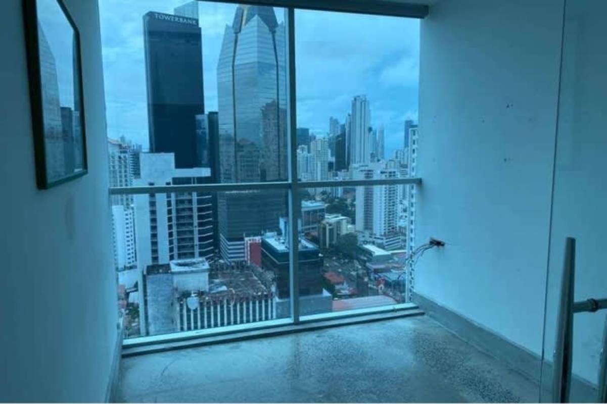 Reception space with marble floors and wood ceiling accents at Hi-Point Tower Bella Vista