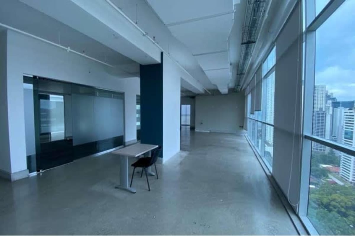 Private glass enclosed executive office at Hi-Point Tower in Panama City's banking district