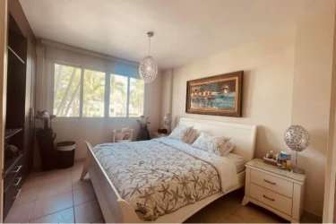 Modern kitchen with granite tops and appliances in Bijao Beach Club Residence Panama