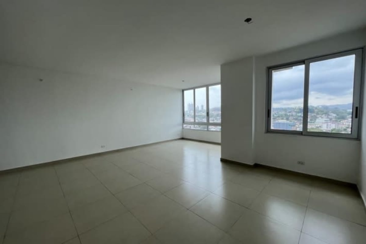 Bright living and dining area with tile floor and large windows Macedonia Towers Bethania Panama