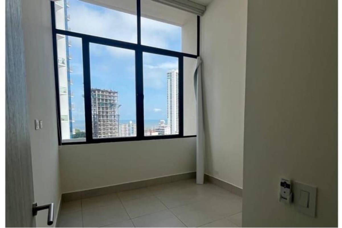 Bedroom with panoramic ocean and city views in PH Coco Skyline Coco del Mar Panama
