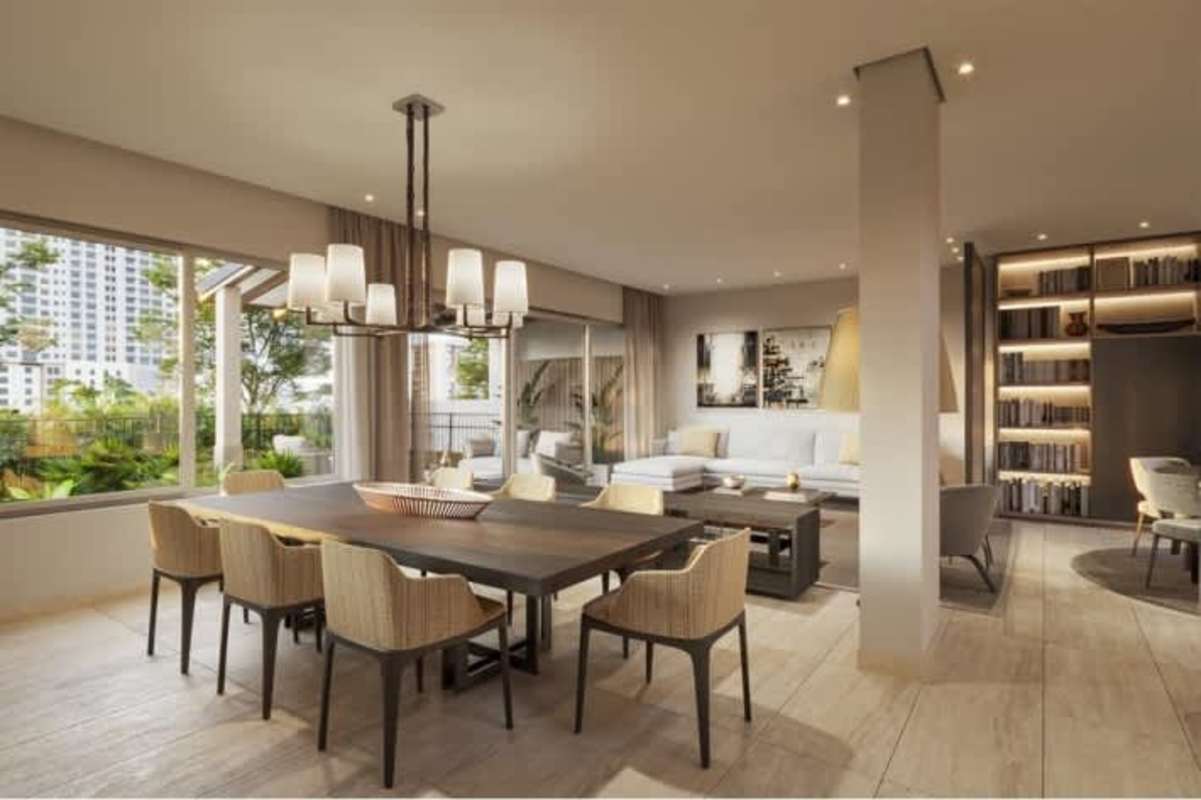 Dining area with chandelier open to living room in upscale residence Santa María