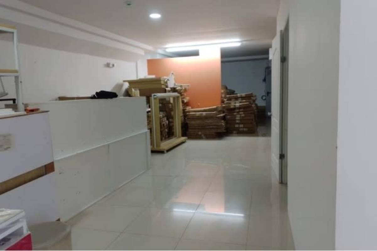 Spacious empty commercial area tile floors glass entrance at Signature Point Bella Vista Panama