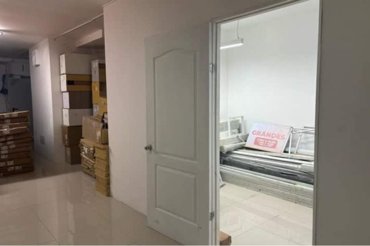 Interior storage with boxes shelves utility items at Signature Point Bella Vista Panama City