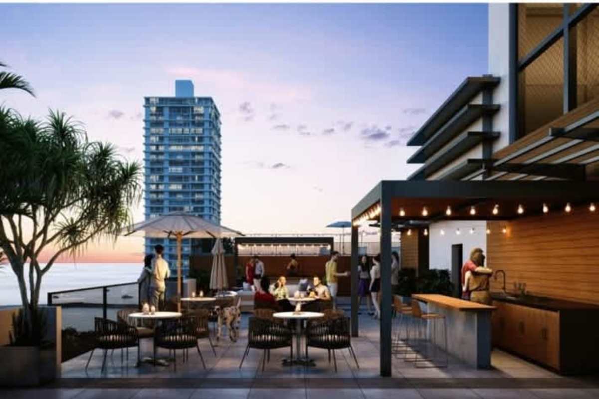 Modern rooftop patio terrace with outdoor kitchen seating and ocean skyline views Balboa District Panama