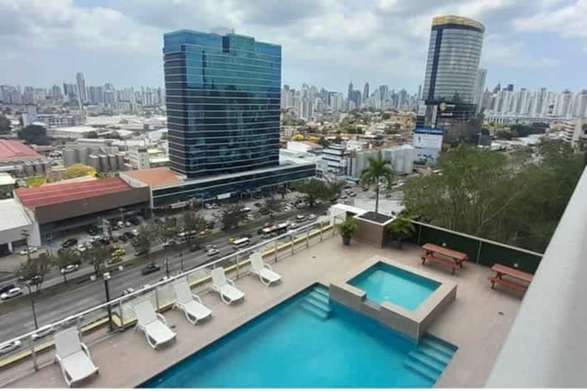Outdoor swimming pool with jacuzzi area and skyline views at PH Hill Tower Dos Mares Betania Panama