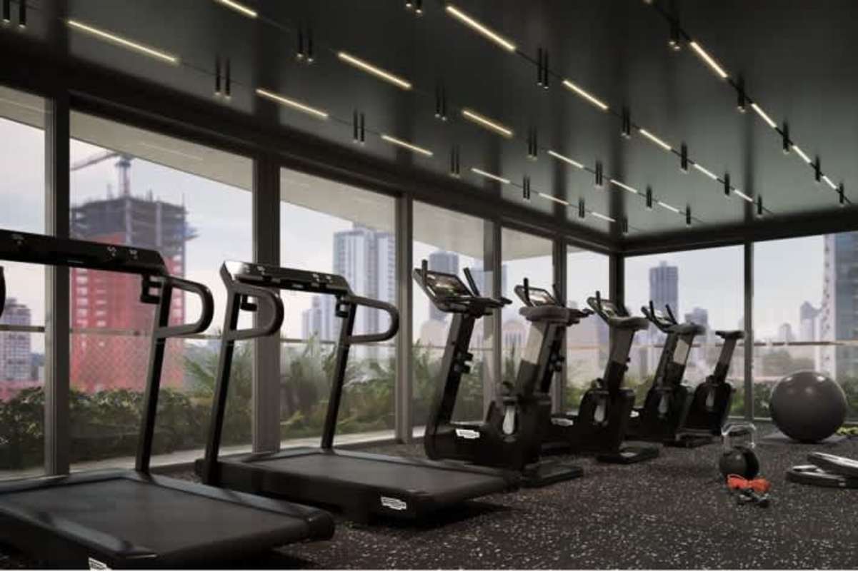 Indoor rooftop gym overlooking Panama City skyline at PH Bella Vita Bella Vista