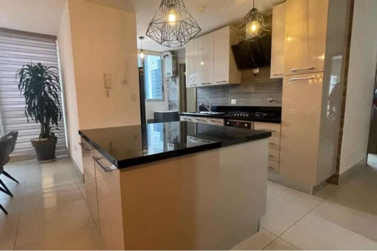 Kitchen island and modern cabinets in rental apartment Obarrio Panama