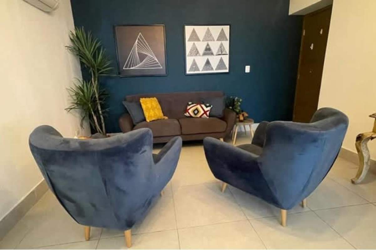 Modern kitchen with stainless appliances, granite countertops in Obarrio Tower apartment