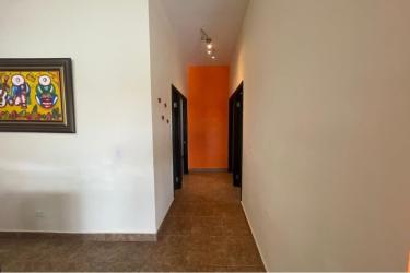 Interior corridor with ceramic tile accent wall recessed lighting PH Villa Brisas Coronado Panama