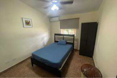 Simple bedroom with wardrobe ceiling fan air conditioning spot tile floor PH Villa Brisas de Lajas Coronado